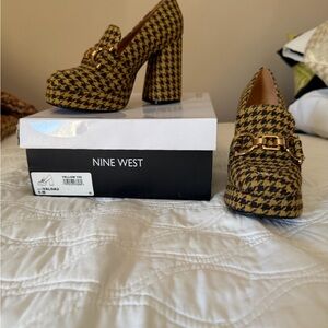 Nine West Houndstooth Platform Heels.Shoe fits more like a size 6